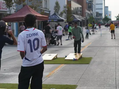 people playing lawn games