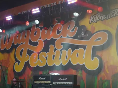 stage with the words wayback festival written on the bacldrop