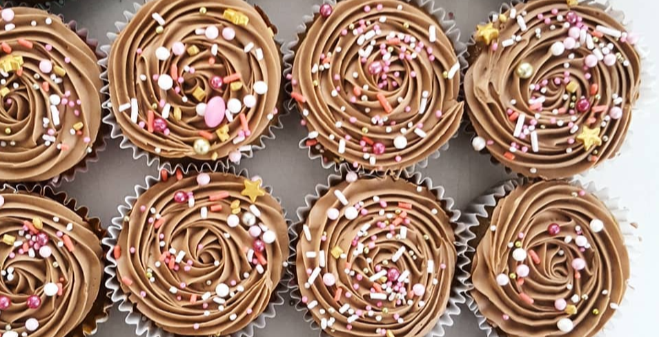 Cupcakes with icing and sprinkles