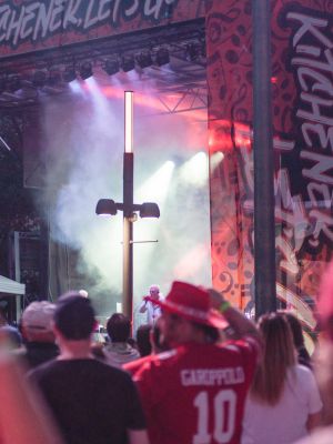 Crowd outside of Kitchener City Hall watching a concert on Canada Day