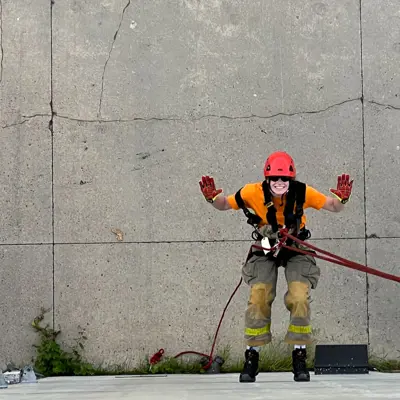 Participant learning about climbing