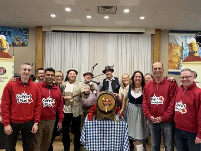 Council posing for photo at Oktoberfest keg tapping