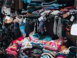 Knitted scarves, mittens, gloves and sweaters