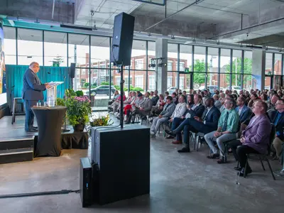 Attendees at State of the City watching the Mayor deliver his speech